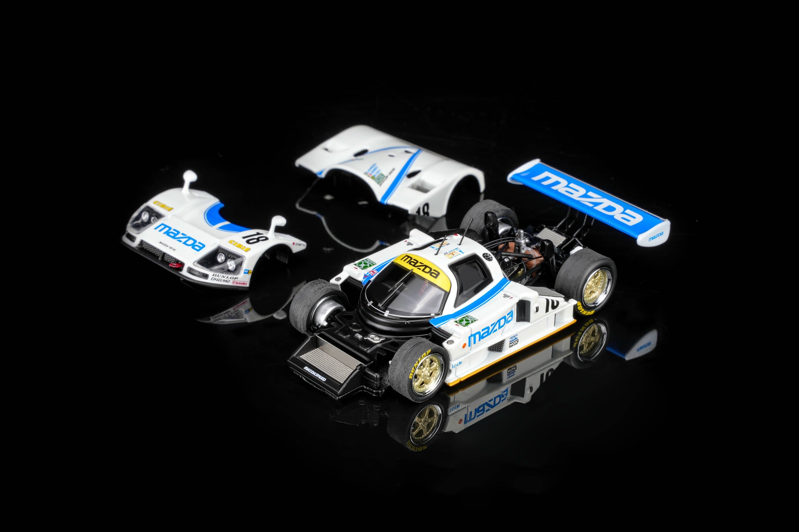 (Preorder) Motorhelix 1:64 Mazda 787B #18 White/Blue M60113