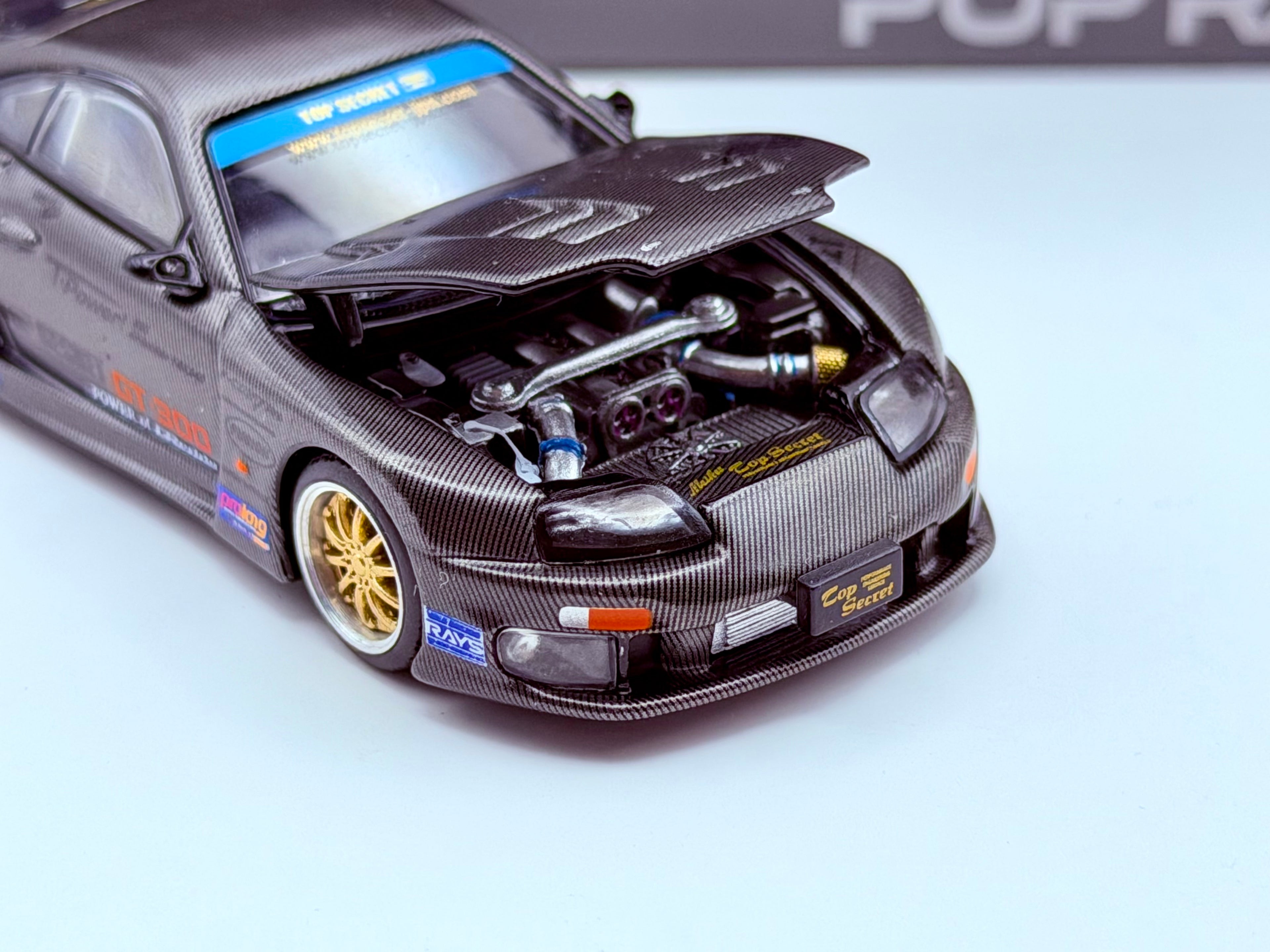 Pop Race 1:64 Toyota Supra Top Secret GT300 TDE 2026 - Carbon Black