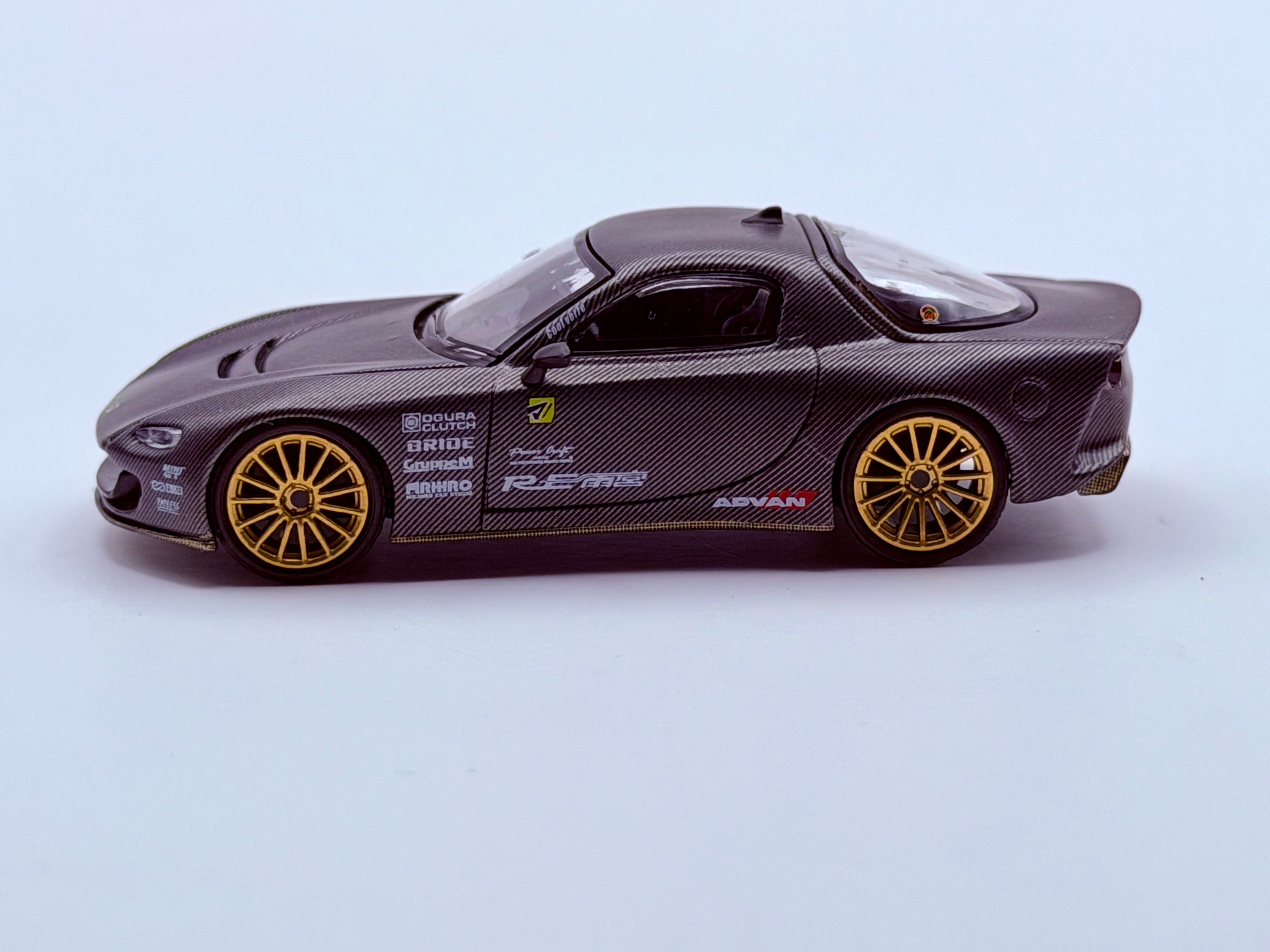 Mini GT 1:64 Mazda RX-7 RE-Amemiya Matsukiyo KOKU 3 Rotor NA-7 TAS 2025 Best Tuned Car Award – Carbon #1205