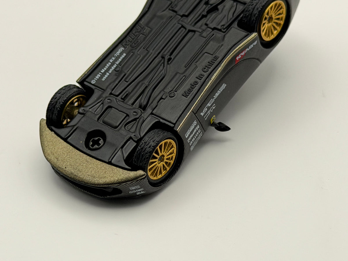 Mini GT 1:64 Mazda RX-7 RE-Amemiya Matsukiyo KOKU 3 Rotor NA-7 TAS 2025 Best Tuned Car Award – Carbon #1205