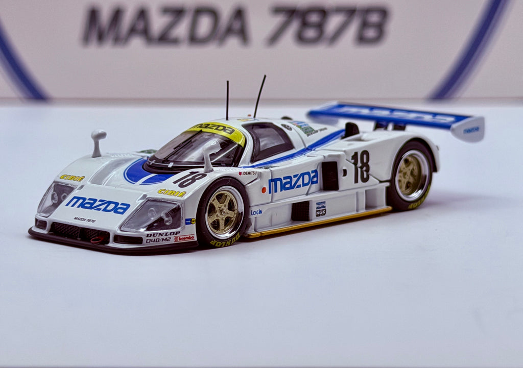 Motorhelix 1:64 Mazda 787B #18 White/Blue M60113