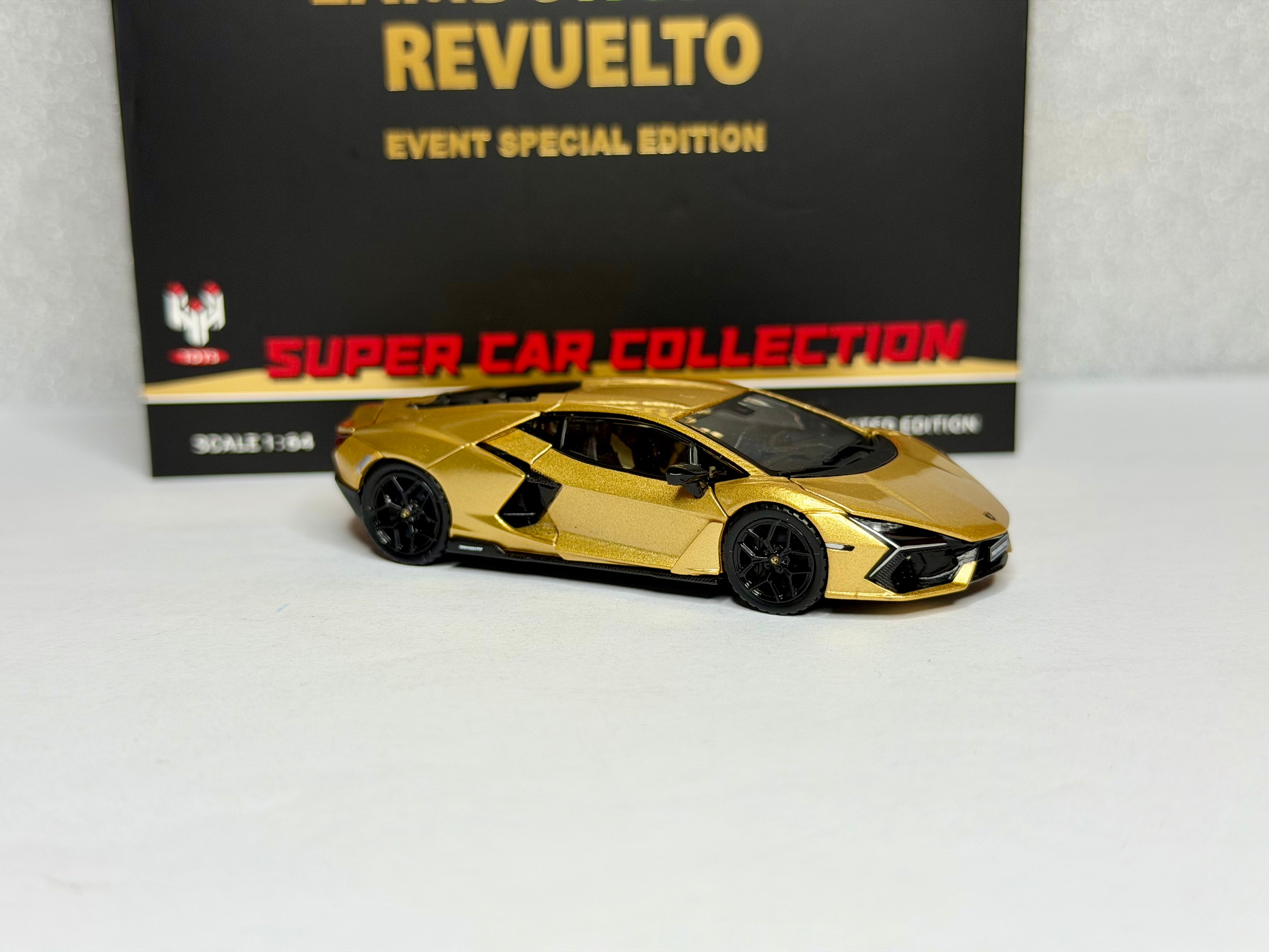 Hung Hing 1:64 Lamborghini Revuelto Gold Metallic HEC 2026 Exclusive