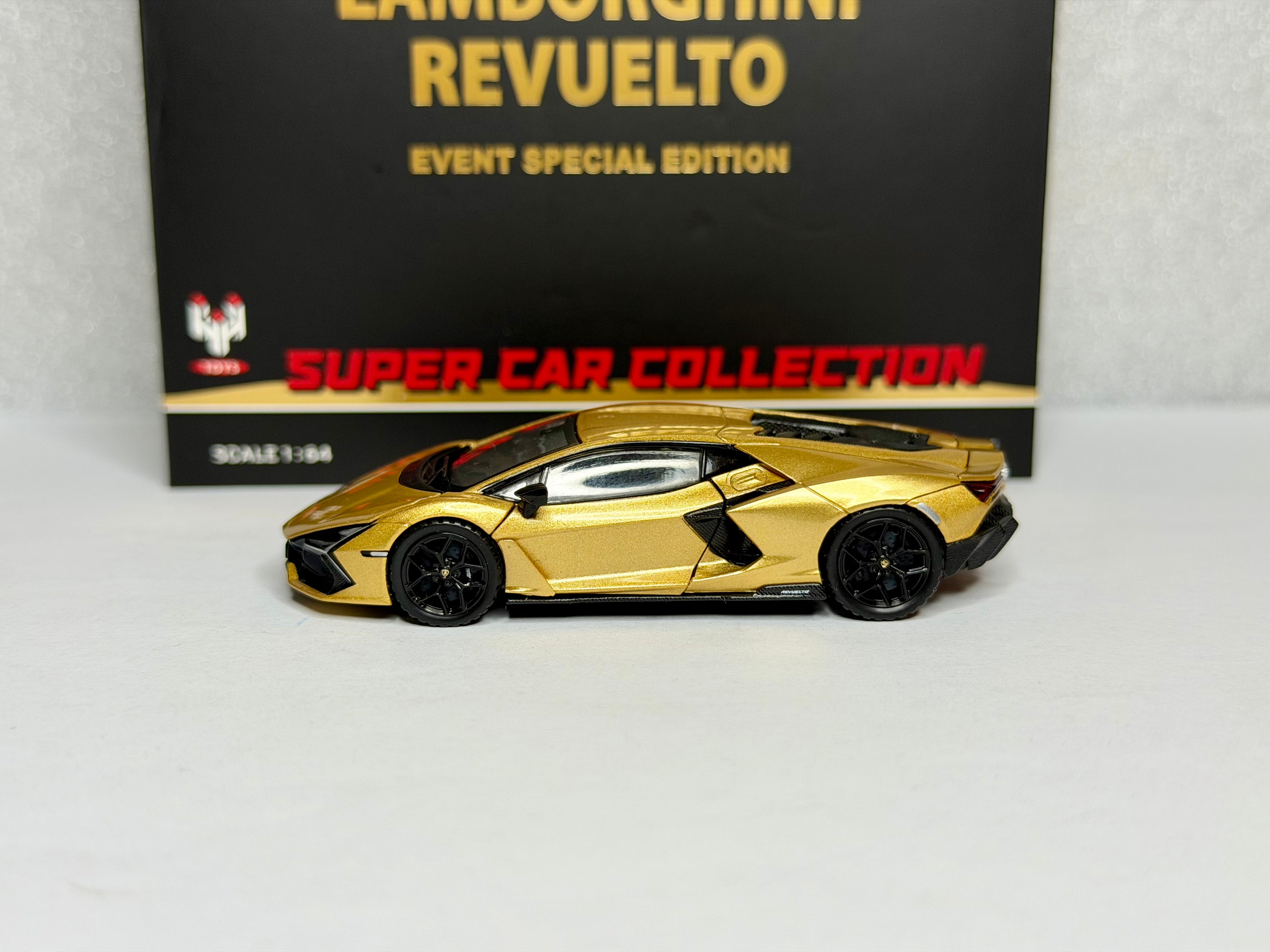 Hung Hing 1:64 Lamborghini Revuelto Gold Metallic HEC 2026 Exclusive