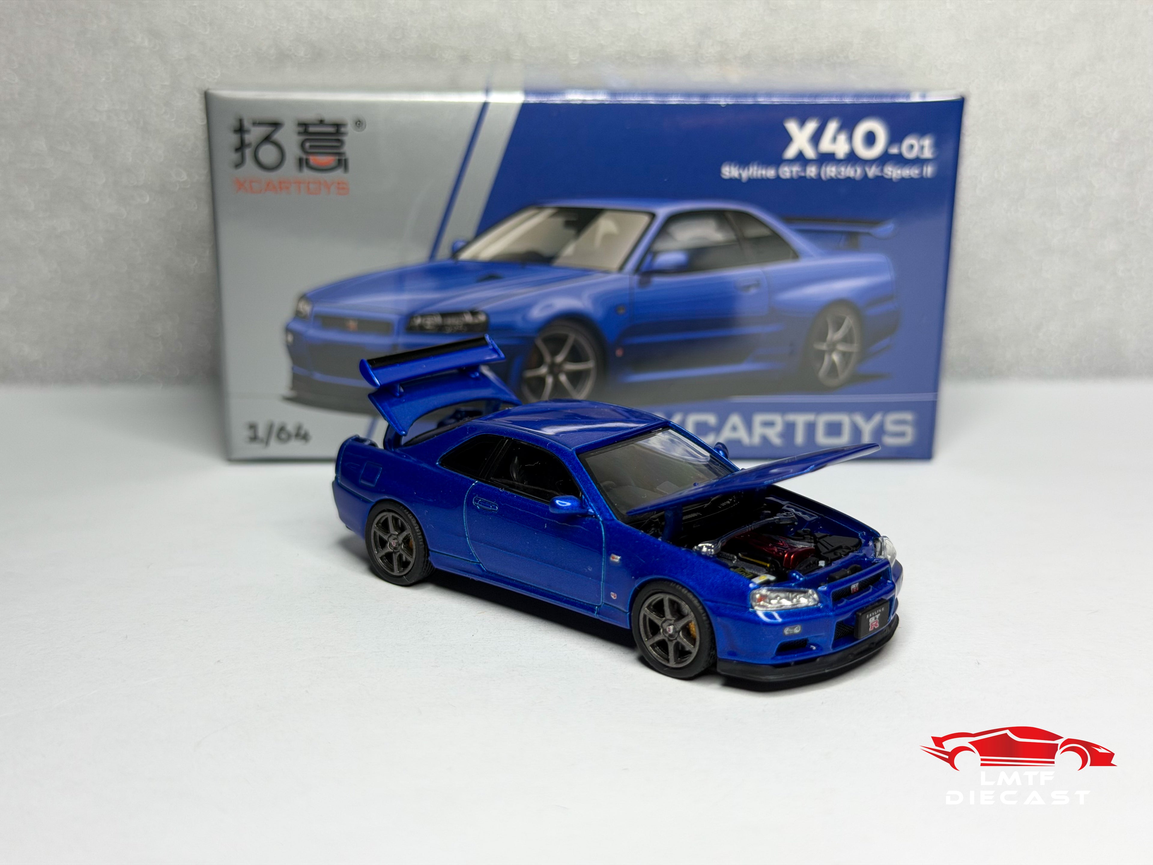 Xcartoys 1:64 Skyline GT-R R34 V-Spec II Bayside Blue Pop Race
