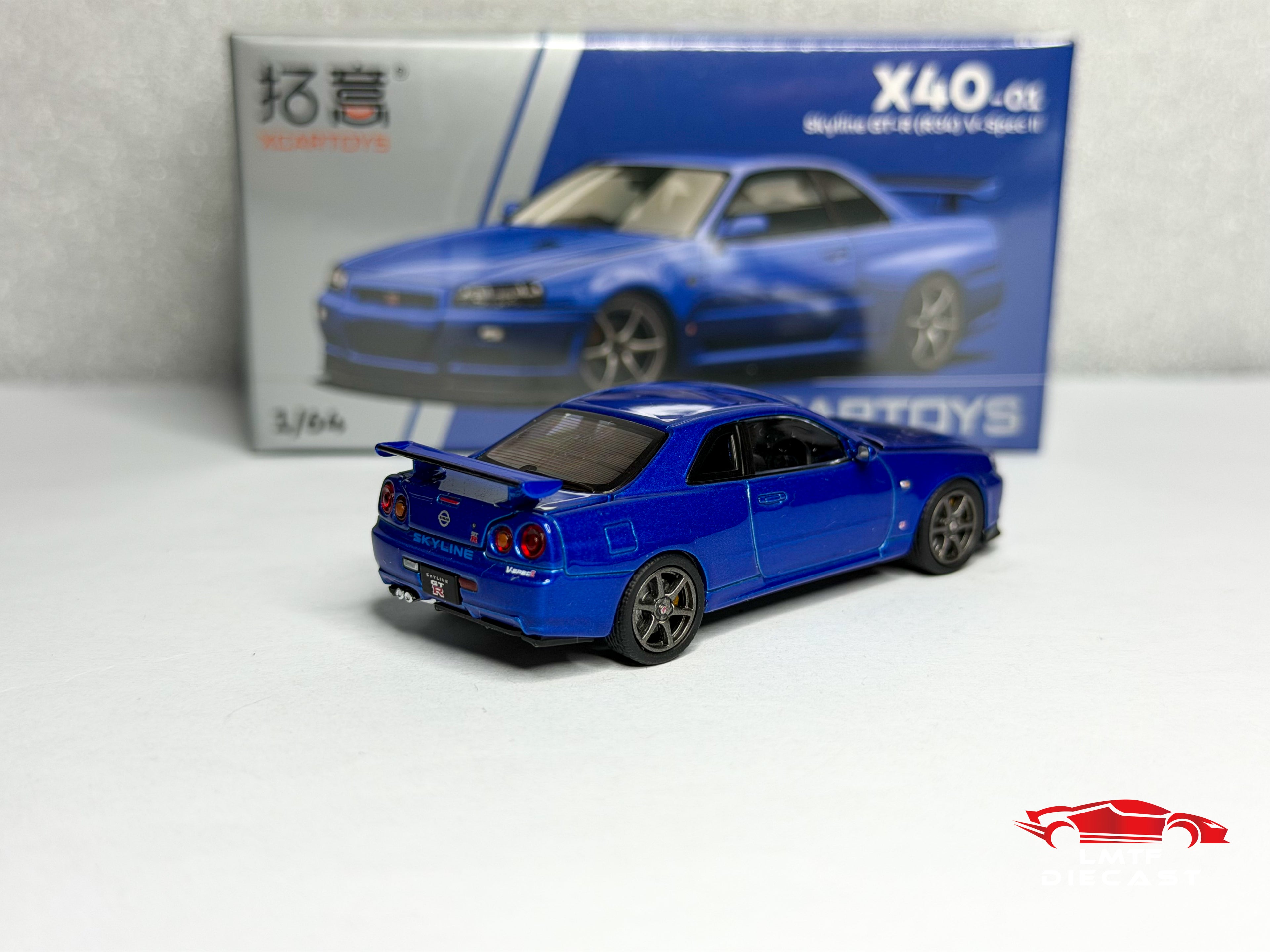 Xcartoys 1:64 Skyline GT-R R34 V-Spec II Bayside Blue Pop Race