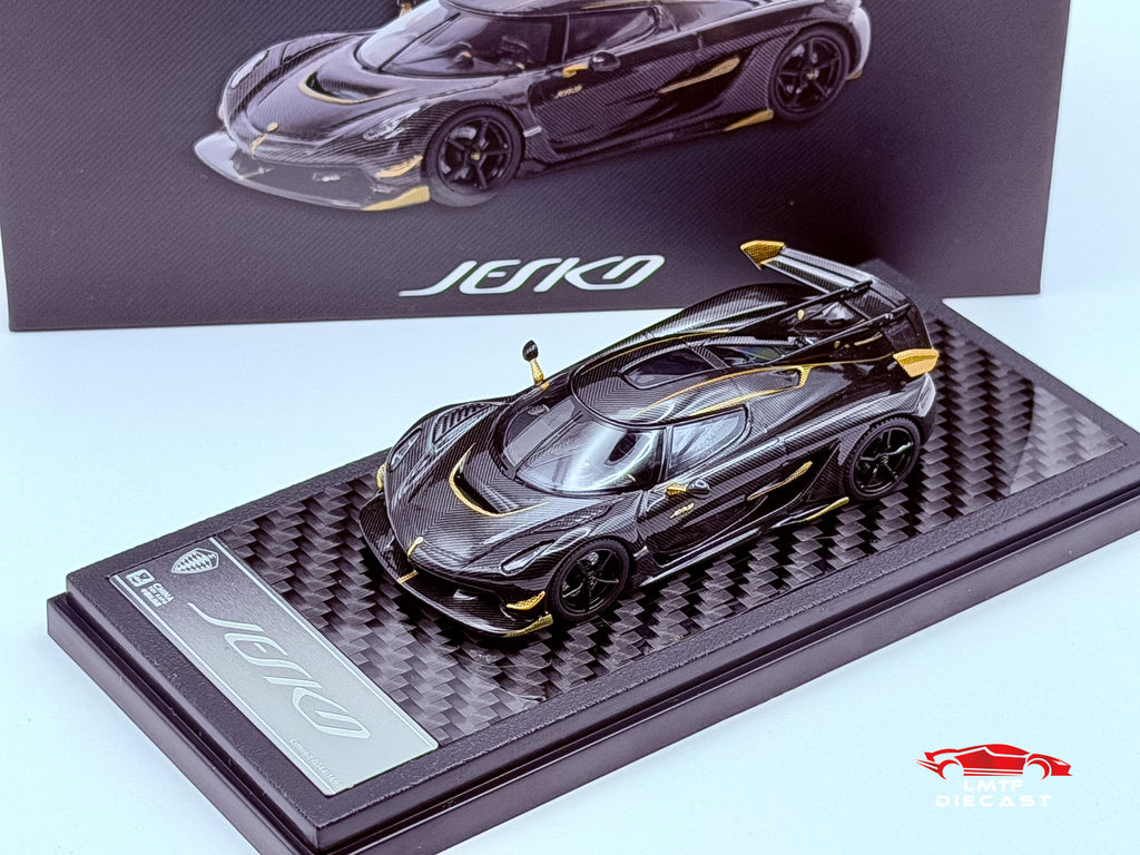LCD 1:64 Koenigsegg Jesko Attack Carbon Black/Gold CTE Exclusive