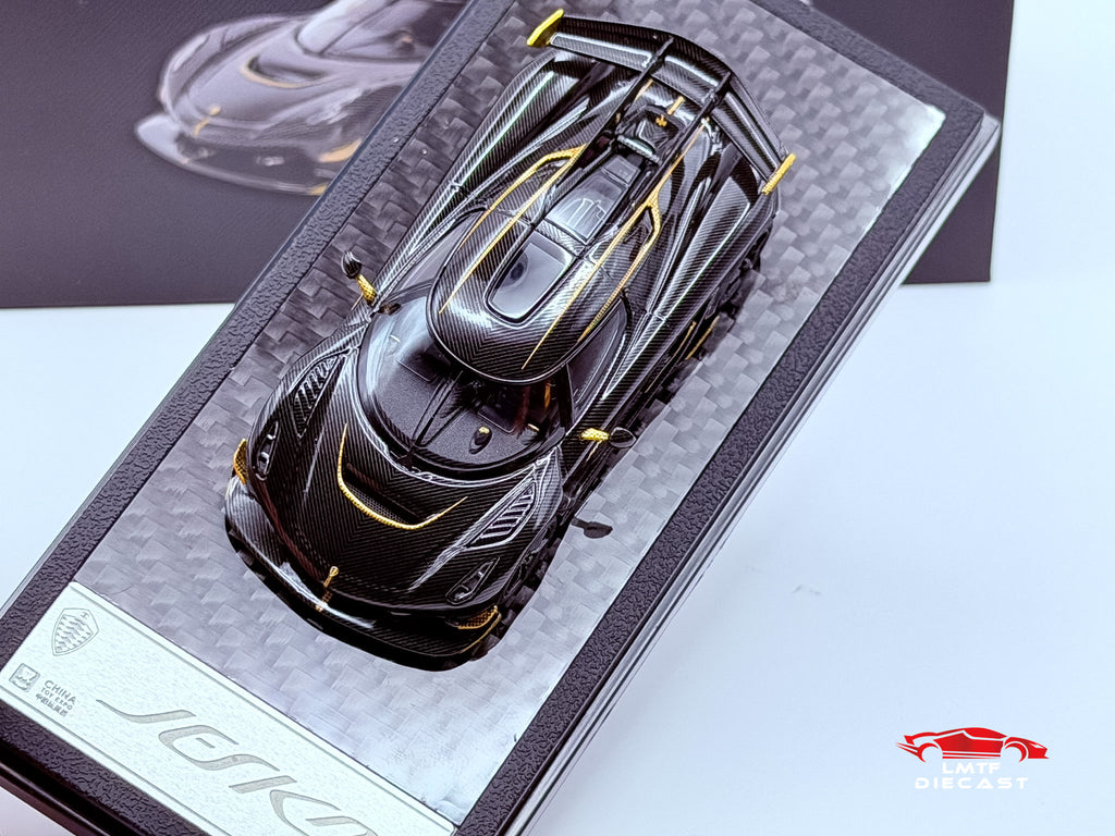 LCD 1:64 Koenigsegg Jesko Attack Carbon Black/Gold CTE Exclusive