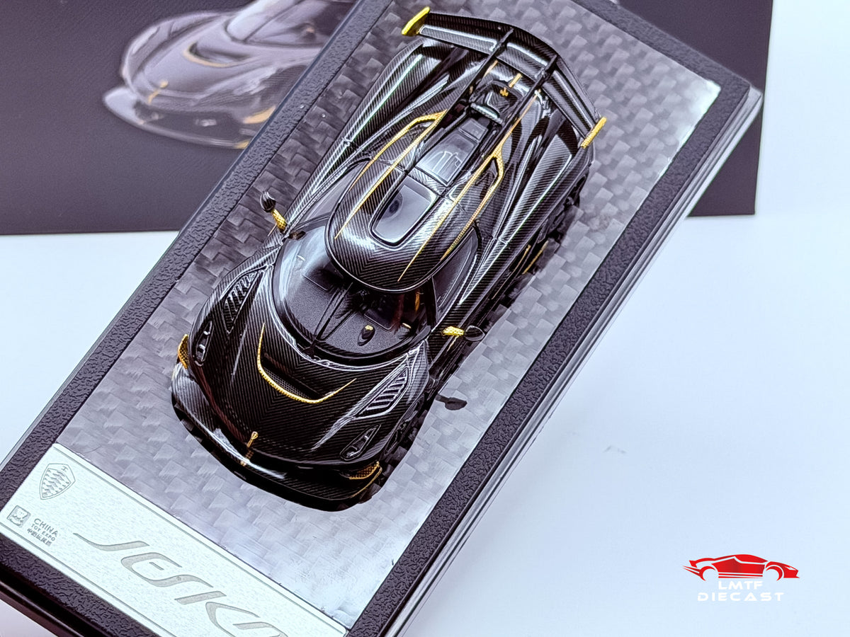 LCD 1:64 Koenigsegg Jesko Attack Carbon Black/Gold CTE Exclusive