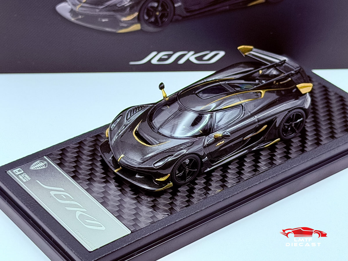 LCD 1:64 Koenigsegg Jesko Attack Carbon Black/Gold CTE Exclusive