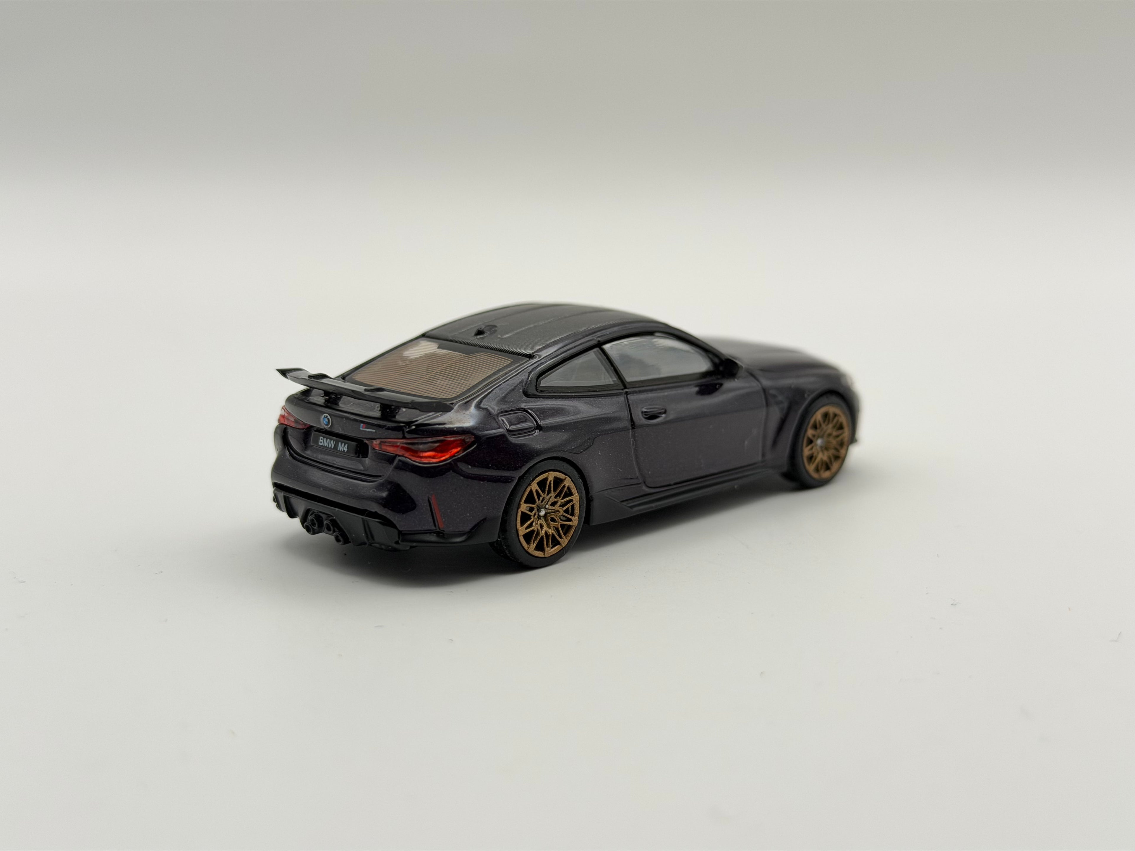 Mini GT 1:64 BMW M4 M-Performance (G82) – Daytona Violet #1112