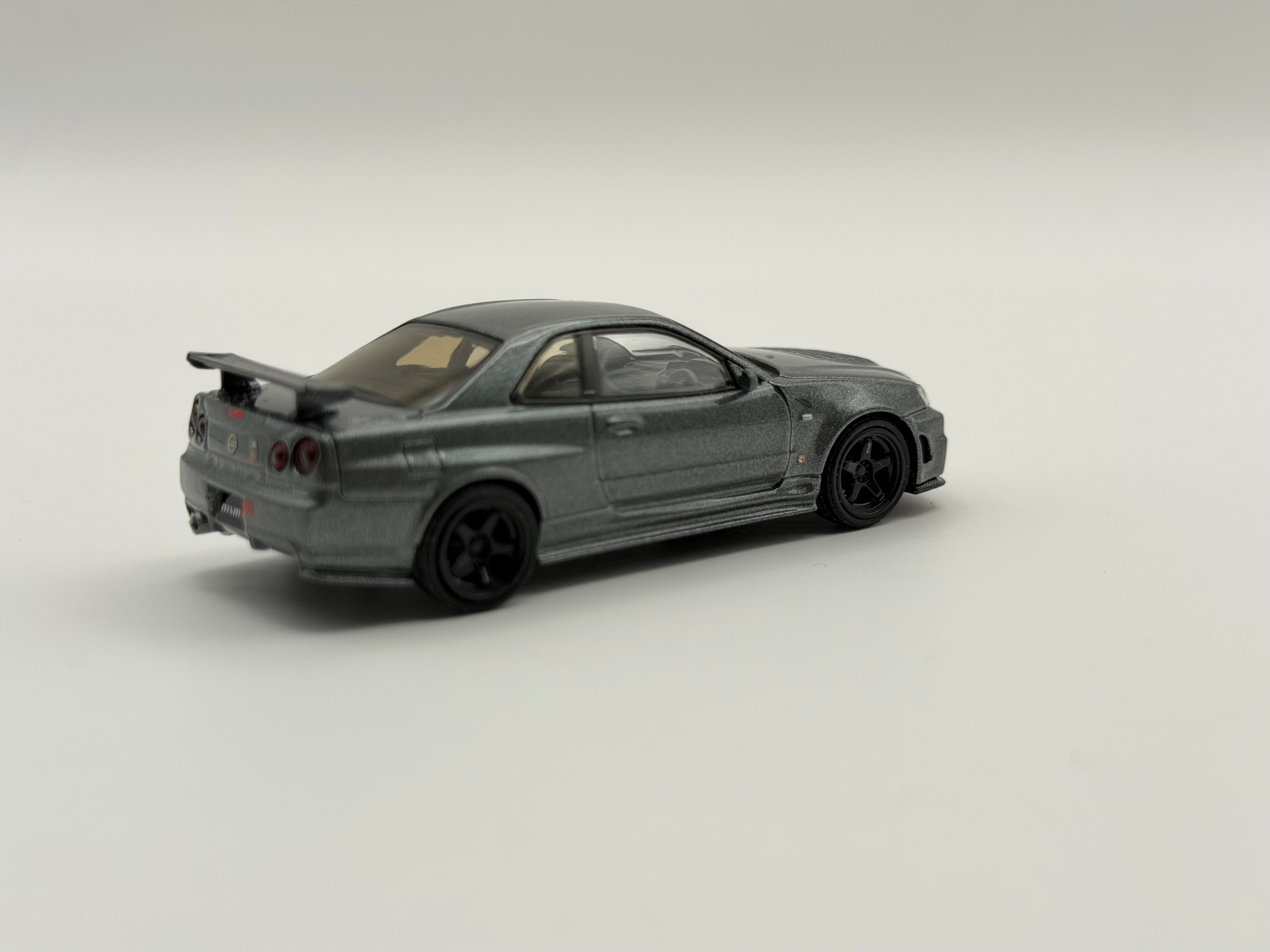 Mini GT 1:64 Nissan Skyline GT-R Dark Metal Gray (NISMO BNR34 CRS Version) #1160