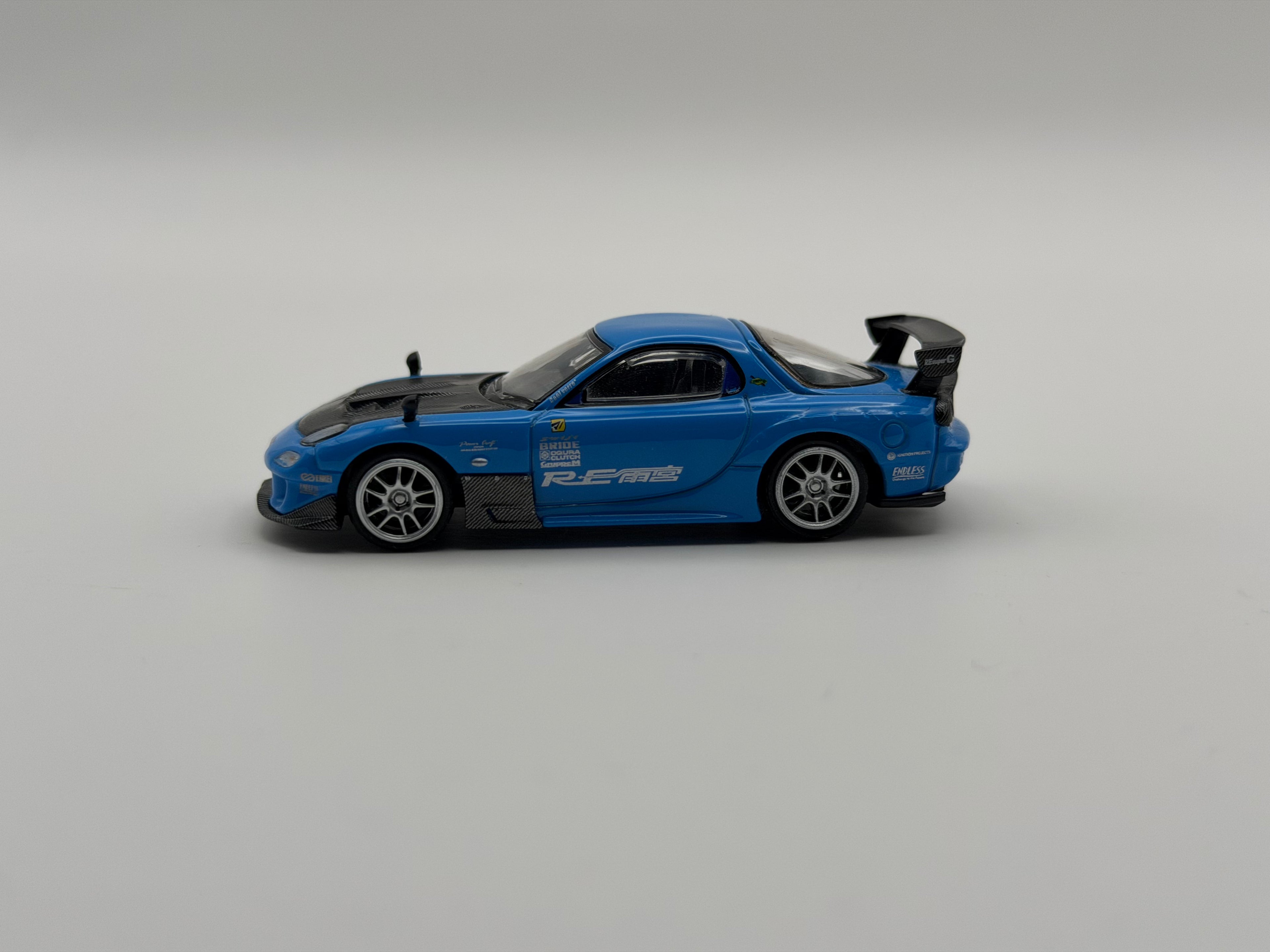 Mini GT 1:64 Mazda RX-7 RE-Amemiya 20B NA 3ROTOR-7 “Ama-san Go” #1046