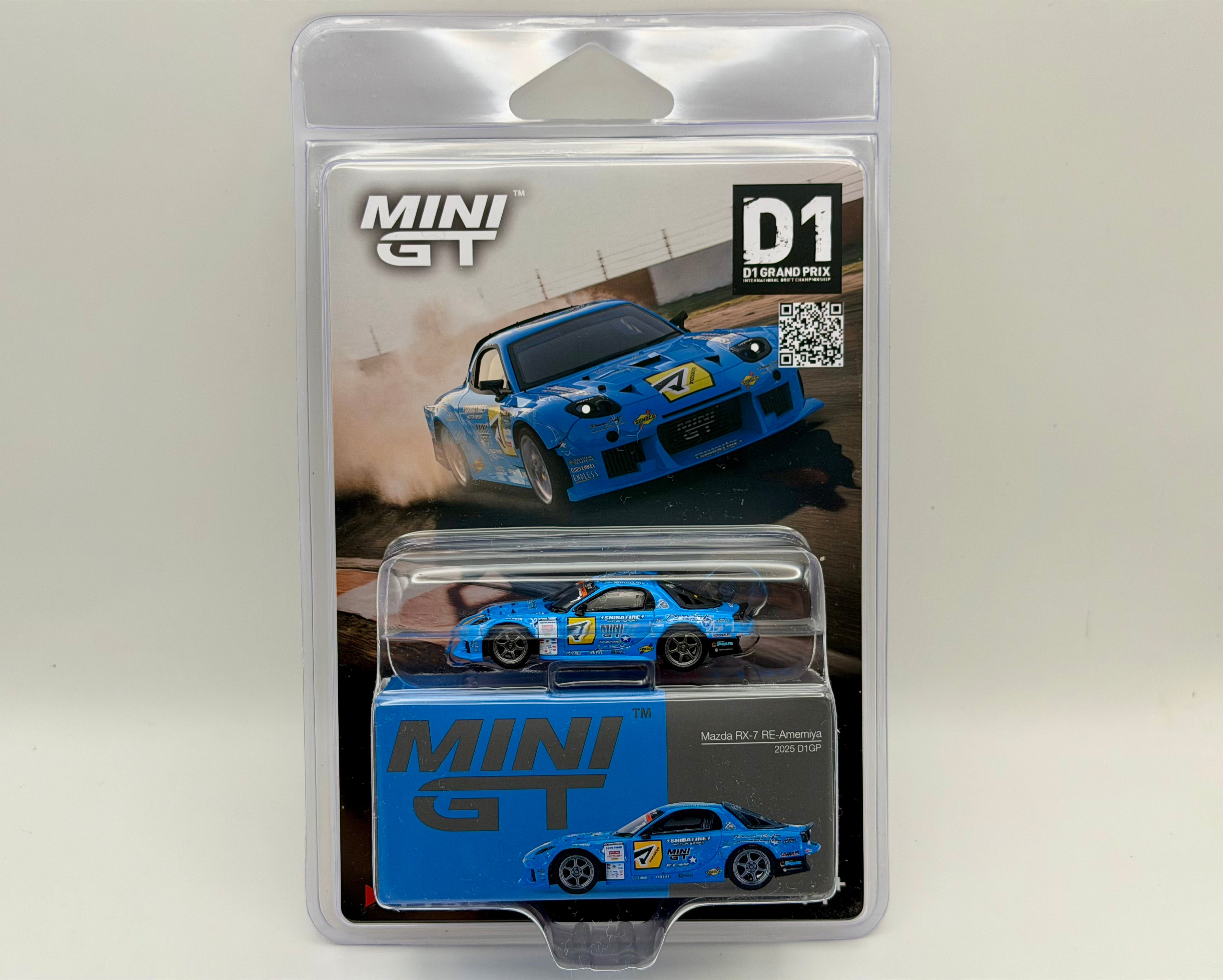 Mini GT 1:64 Mazda RX-7 RE-Amemiya 2025 D1GP – Blue #1195