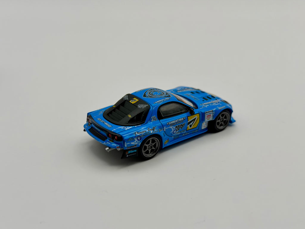 Mini GT 1:64 Mazda RX-7 RE-Amemiya 2025 D1GP – Blue #1195